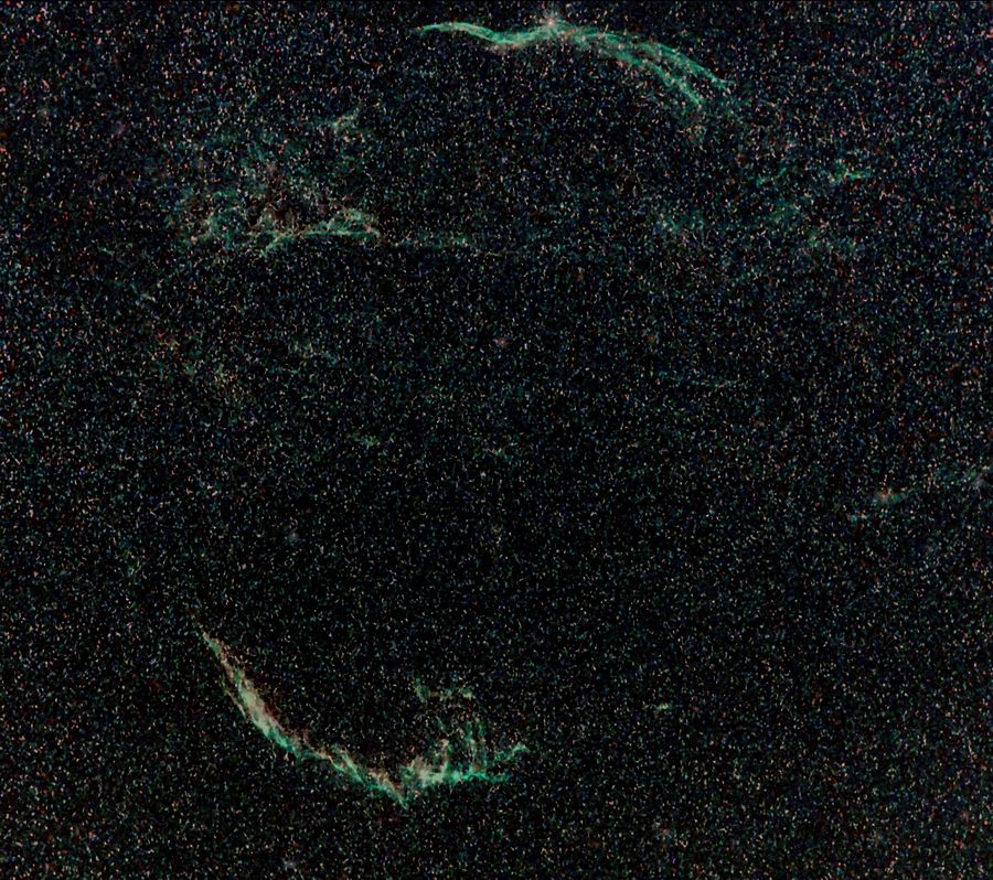 The filamentary red and teal arcs of the Veil Nebula