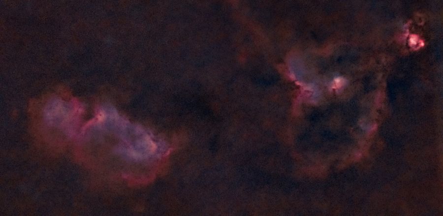 The Heart and Soul nebulae glowing red in Cassiopeia
