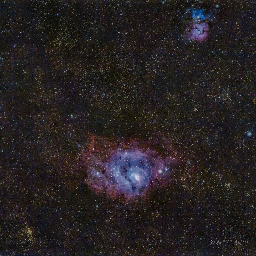 The Lagoon Nebula and the smaller Trifid Nebula in a dense star field