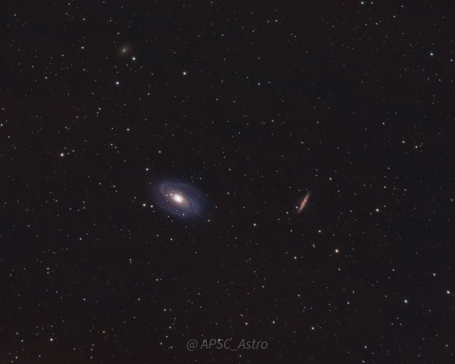 Two galaxies: a face-on spiral and an edge-on starburst galaxy