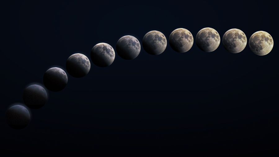 A sequence of the Moon through its phases, arranged in an arc